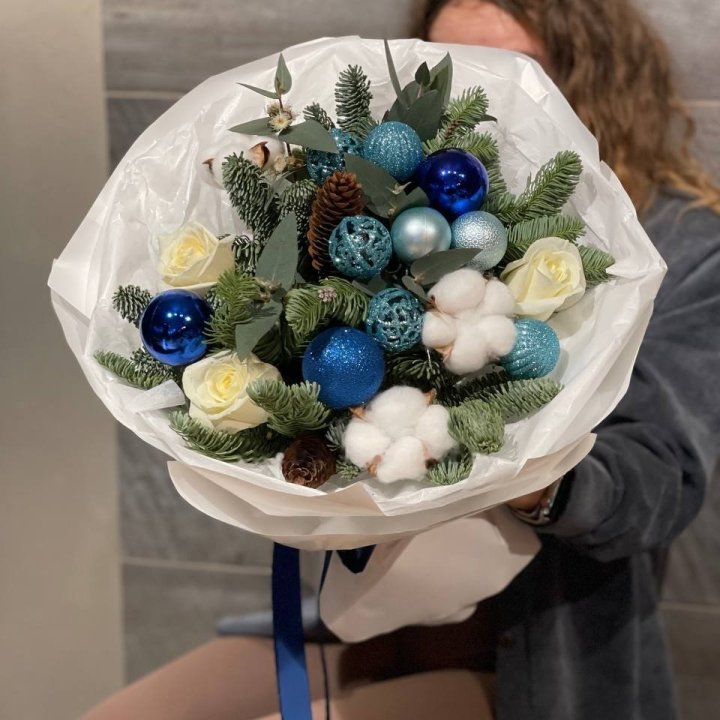 Flower basket in a single deep shade standing away from a bright window