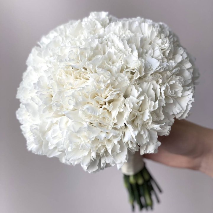 Underside of a bridal bouquet showing the spiral of stems